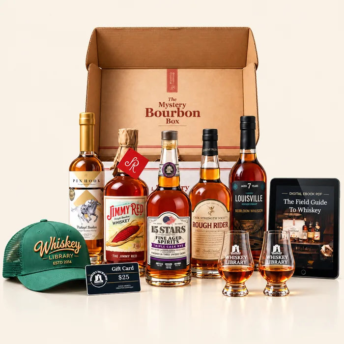 The Bourbon Mystery Box with bottles, tasting glasses, the Field Guide and a Whiskey Library hat