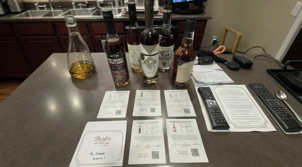 A member's Whiskey Library box laid out at home